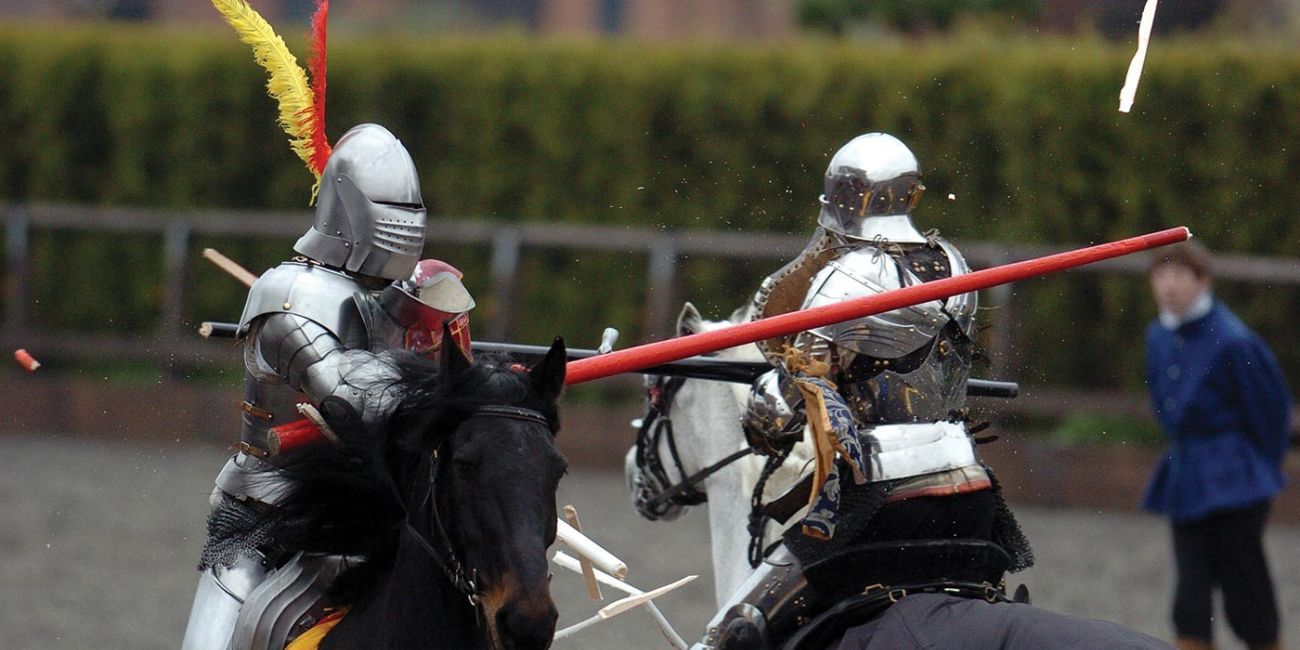 Jousting knights joust on horse back