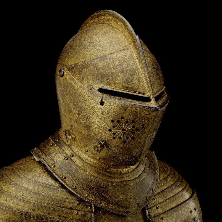 Armour decorated with engraving and covered in gold