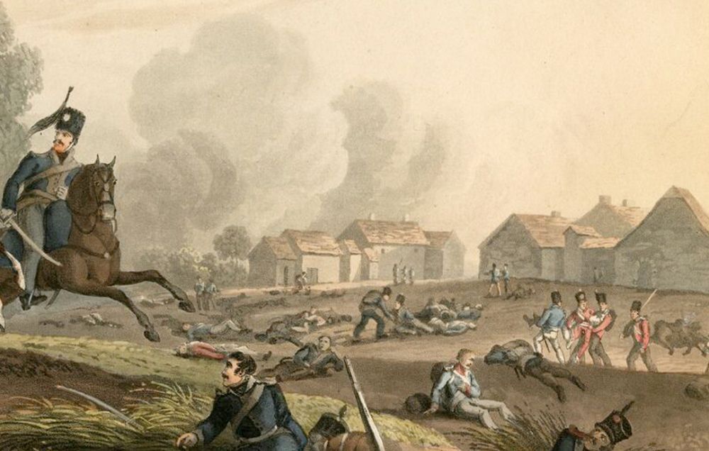 The landscape is littered with injured soldiers and behind them, a building is on fire