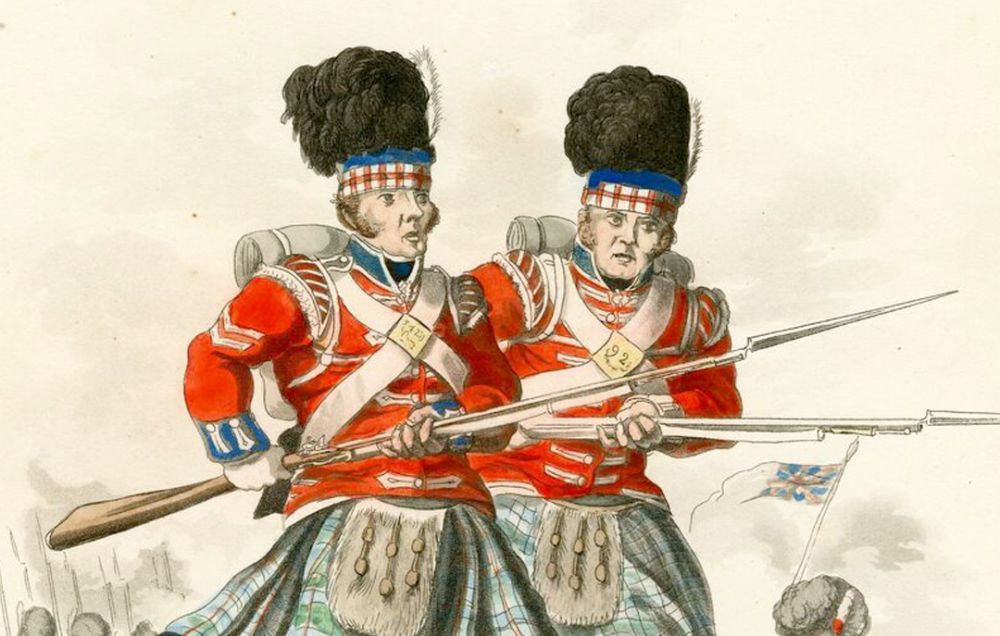 Two Scottish guardsmen rush forward