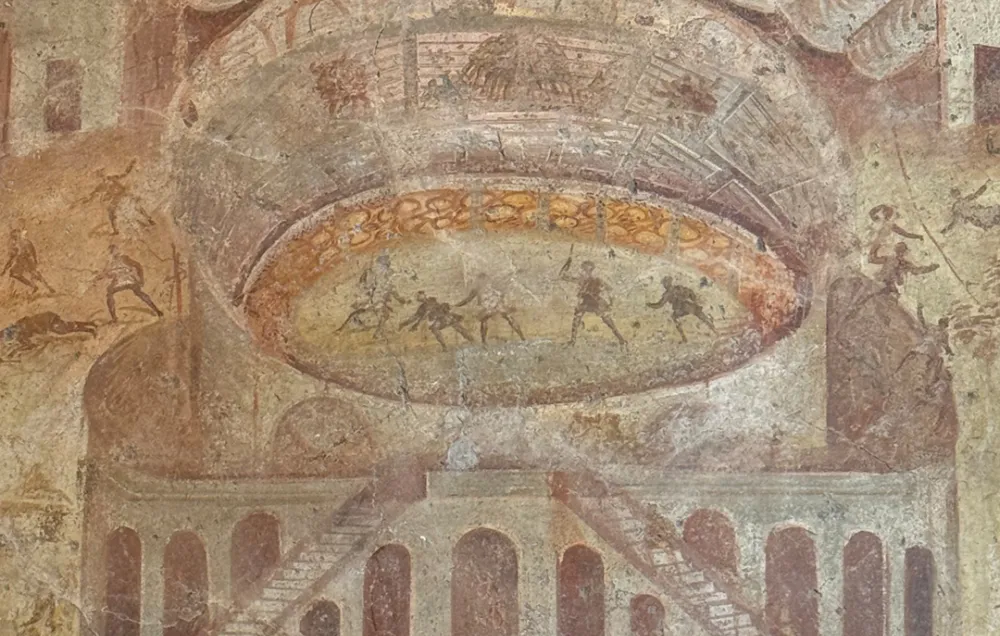 A Roman fresco of the Pompeian riot of 59 CE, with the amphitheatre in the centre