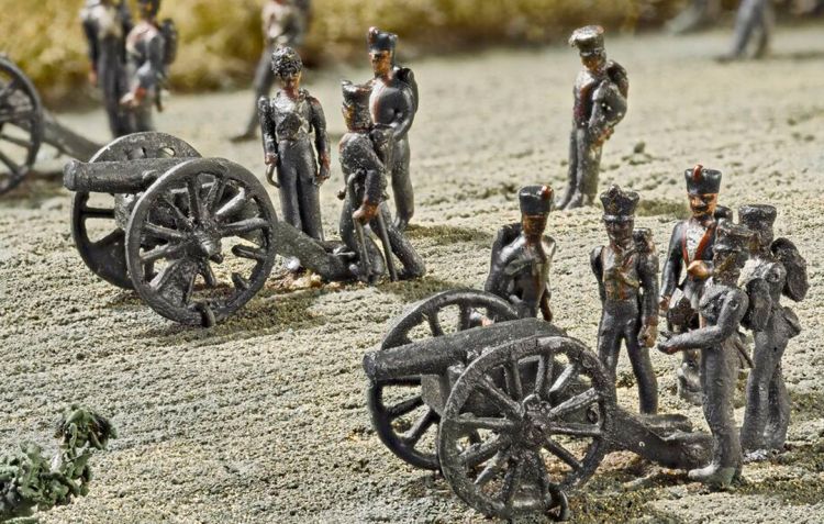 A battery of French cannons open fire on the enemy