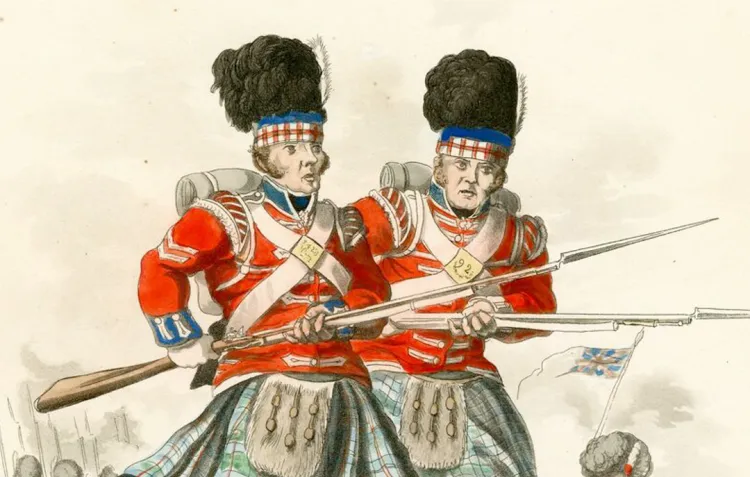 Two Scottish guardsmen rush forward