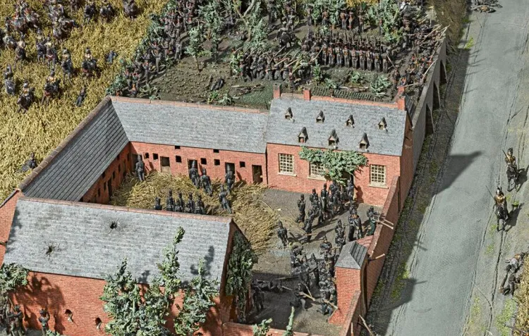 A model of La Haye Saint farmstead in Belgium, complete with miniature guards manning the walls