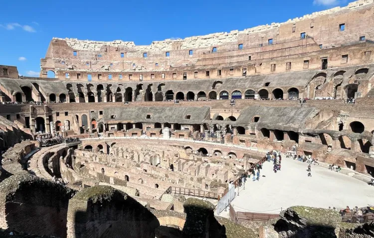A photo taken on a clear day of the interior of the Colosseum in Rome