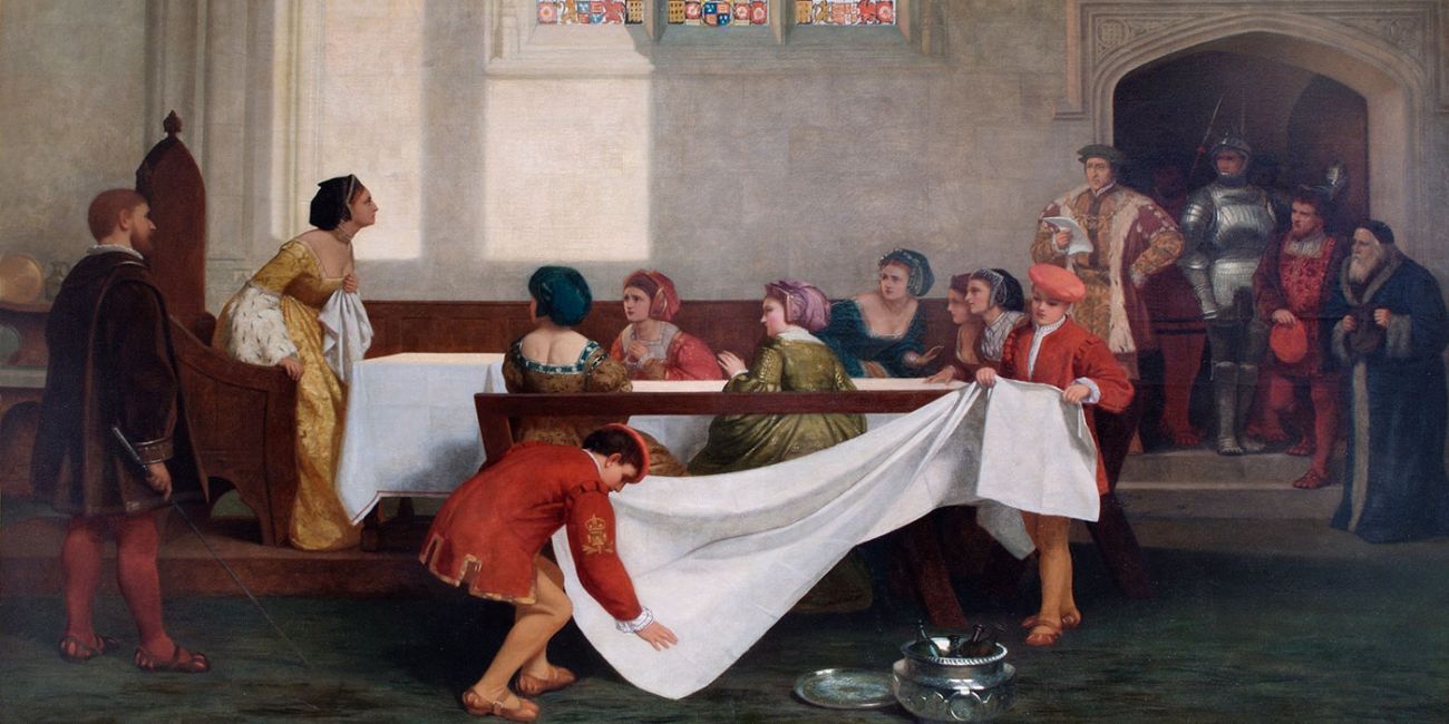 Painting of people gathered around a table with white cloth