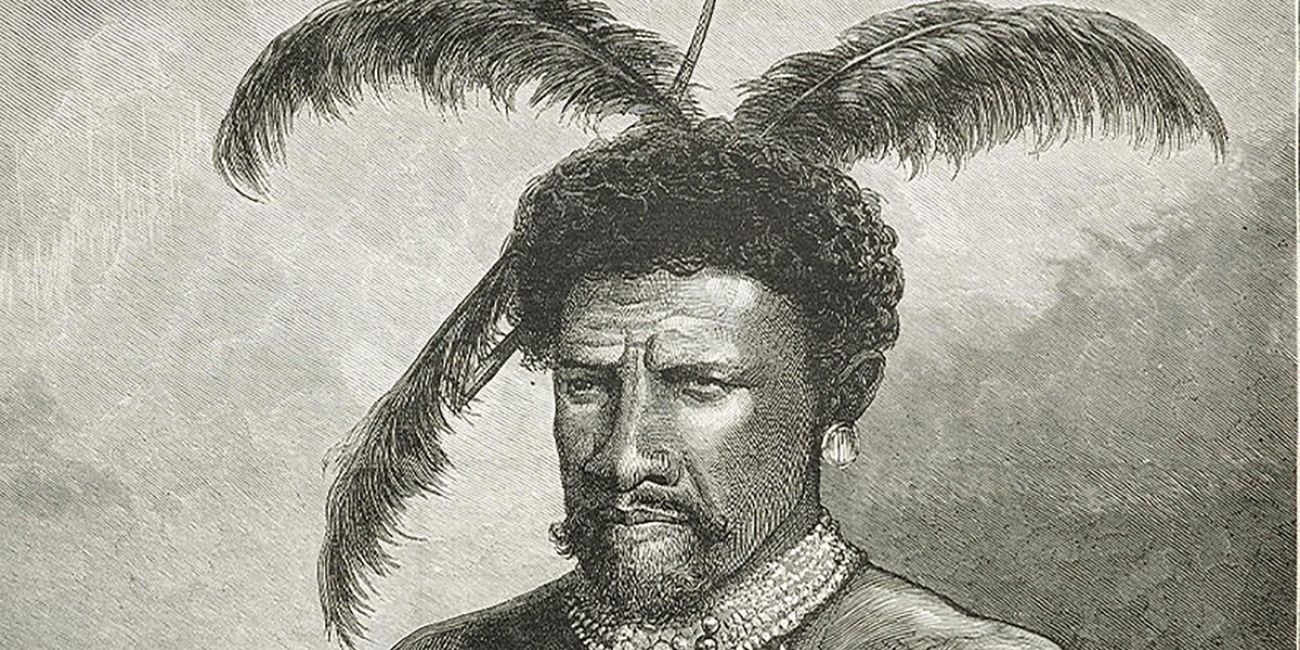 an African leader with feathered headdress