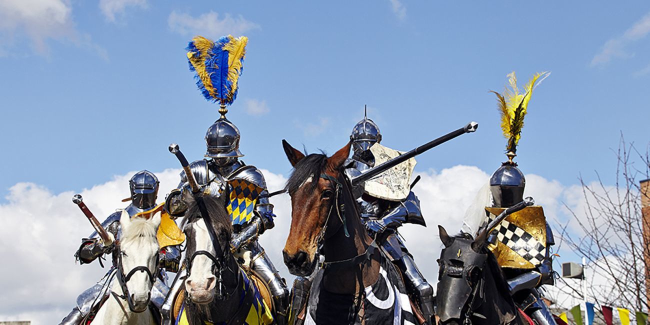 four armoured knights on horseback