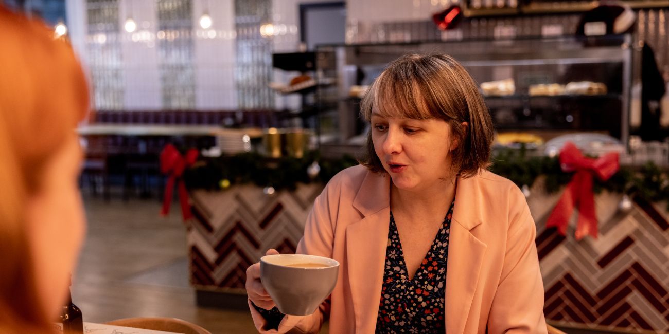 customers enjoying food and drink in the Masters café