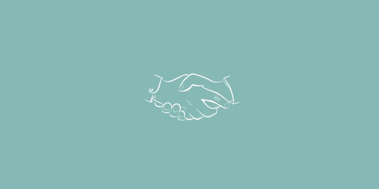 hands shaking on green background