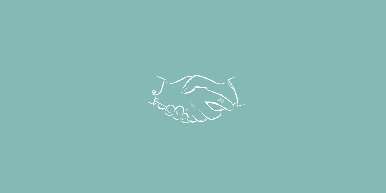 hands shaking on green background