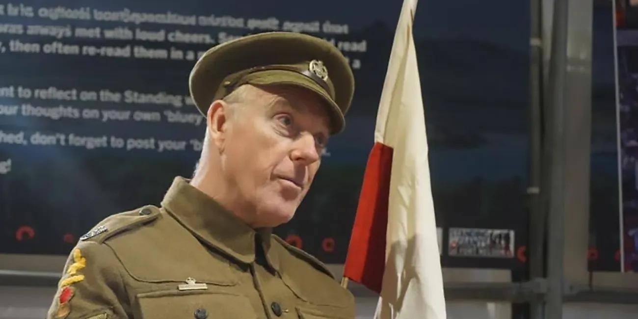Actor in First World War soldier's uniform reading leters