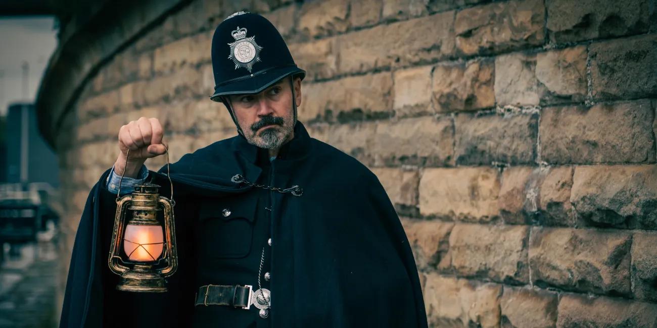 Actor dressed as Victorian policeman