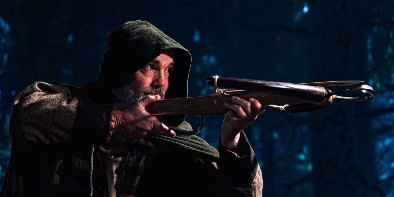 Man with crossbow