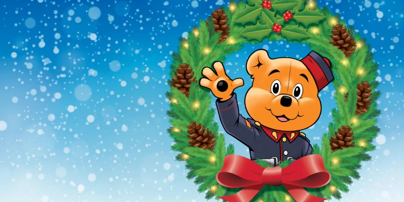 Illustration of bear in a Christmas wreath