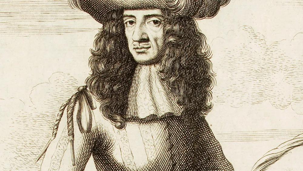 A portrait of a man in a long flowing wig, a thin moustache, and a metal breastplate.