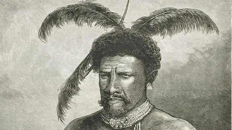 an African leader with feathered headdress