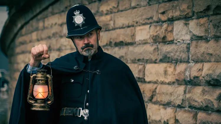 Actor dressed as Victorian policeman