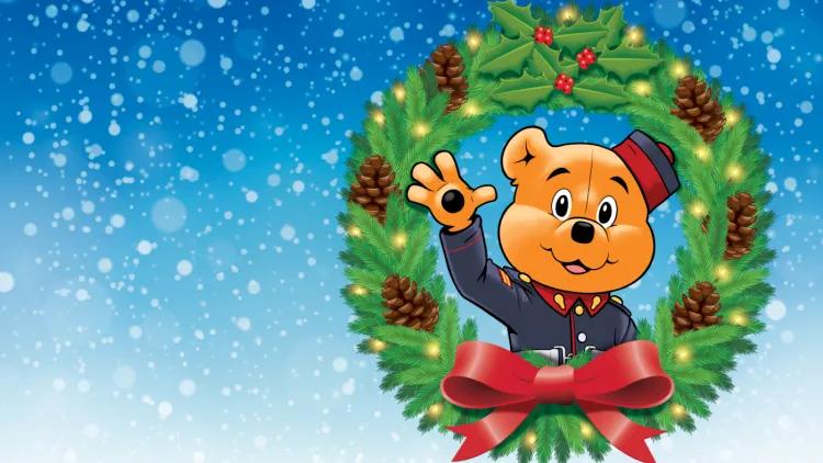 Illustration of bear in a Christmas wreath