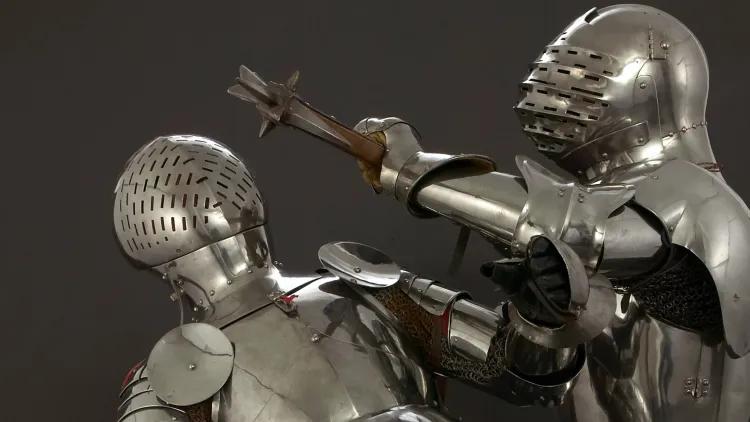 Two knights battling in armour with pollaxe