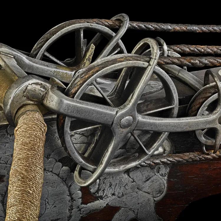 Up close intricate detail of the spanning mechanism of a target crossbow