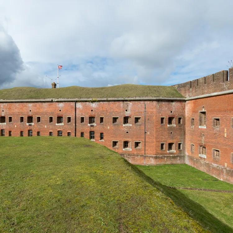 Walls of Victorian fort and grassed moat