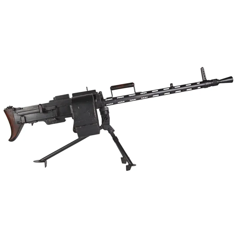 Black light machine gun with small tripod mount, top handle, air-cooled barrel, and krank loaded Kurbel drum.