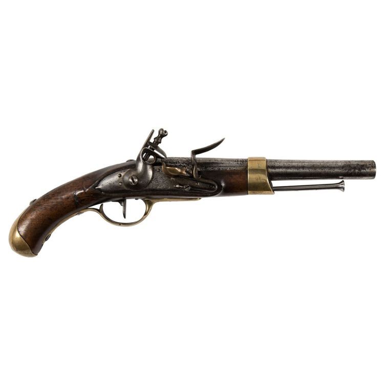A short barrelled pistol finished in wood, steel, and brass