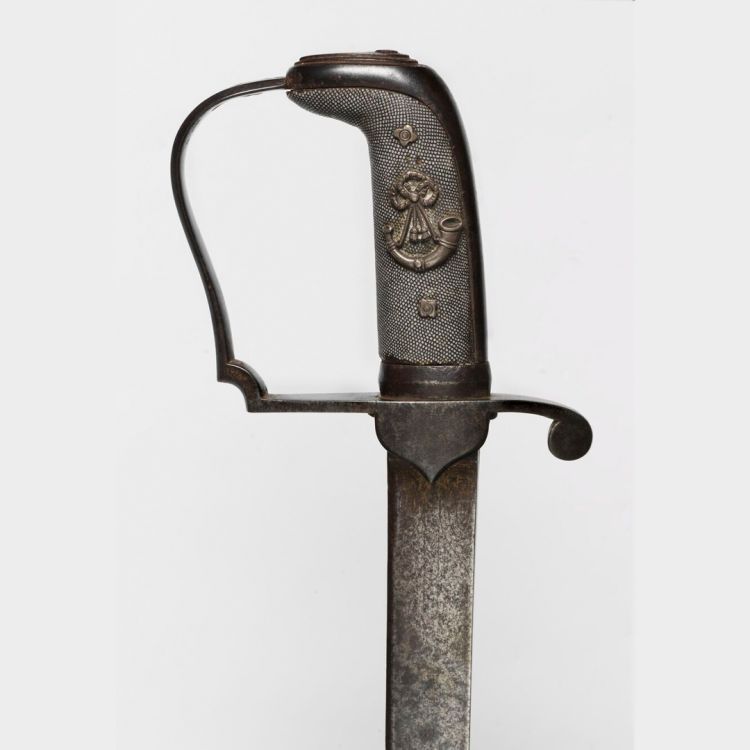 An infantry officer's sword with crowned light infantry bugle, wreathed in royal arms engraved on the hilt