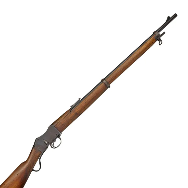 A long barrelled rifle in wood and steel, with teardrop shaped cocking indicator