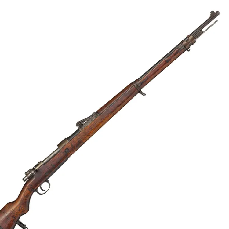 A long barrelled rifle finished in wooden with metallic fittings