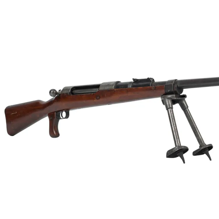 A large, heavy, long-barrelled rifle supported by a bipod in the centre