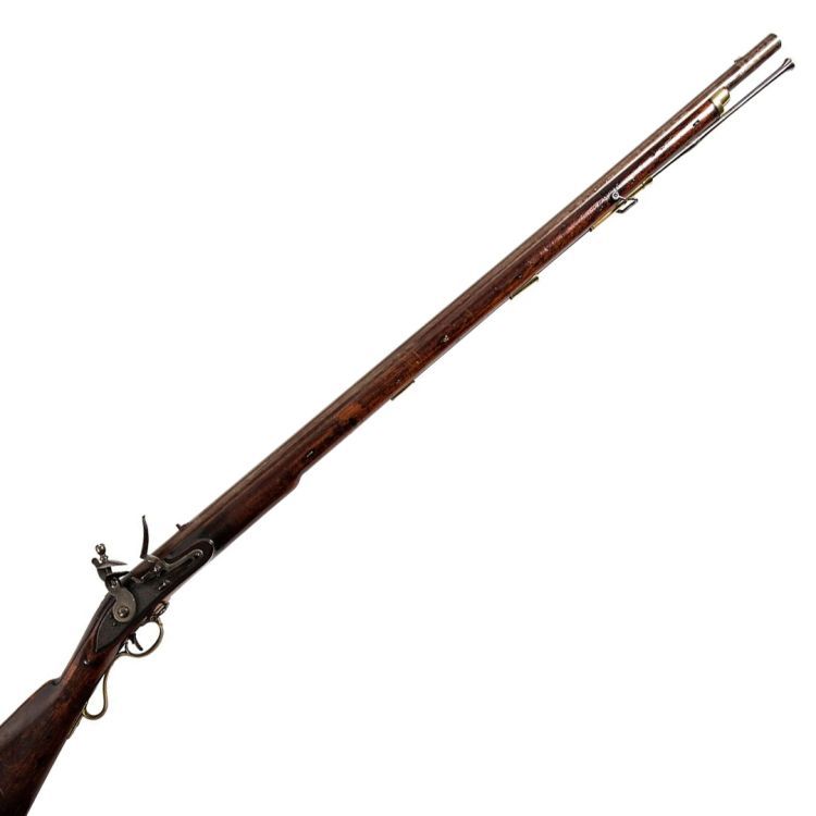 A long barrelled musket with brass buttplate, finished in walnut wood and iron.