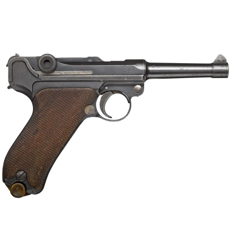 A wooden grip on a metallic pistol body with a protruding barrel