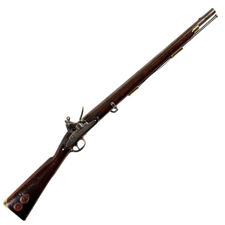 A long barrelled rifle in wood, steel, and brass, with two red wax seals on the buttstock.