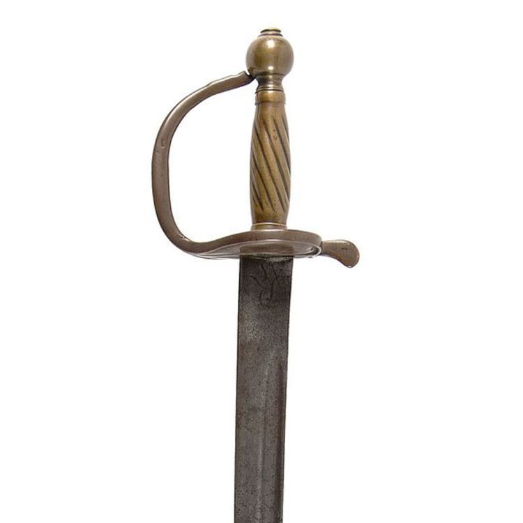 Brass hilt, fluted grip and knuckle bow attached to a curved single edged blade.