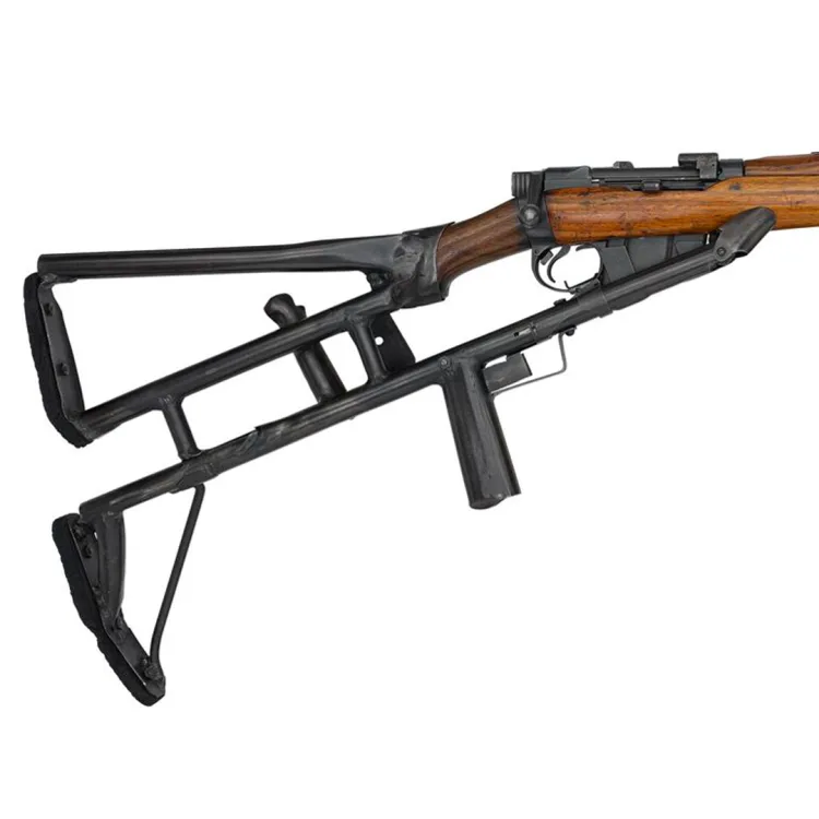 A rifle with blued, metallic stock adapted for overhead trench fire