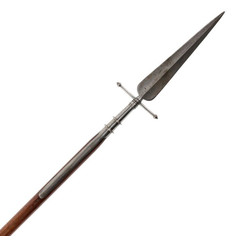 A long wooden shaft with a broad metal spear point attached