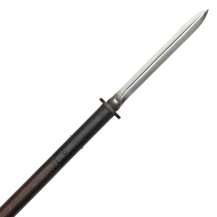 Dark, wooden staff with diamond-sectioned steel blade
