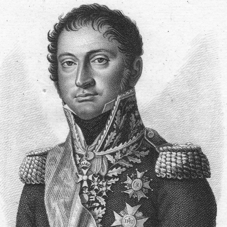 A black and white engraving of Michel Joseph Reille, in high-collared French military uniform with pale sash and medals