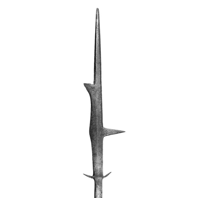 A metal rectangular blade with a spike on the reverse of the bottom third, a shorter hook spike on the front of the second third, and a long, thin point on top. 