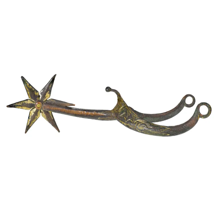 Slender, slightly curved upward wish-bone shaped bar of metal leading to a small six pointed star on the heel.