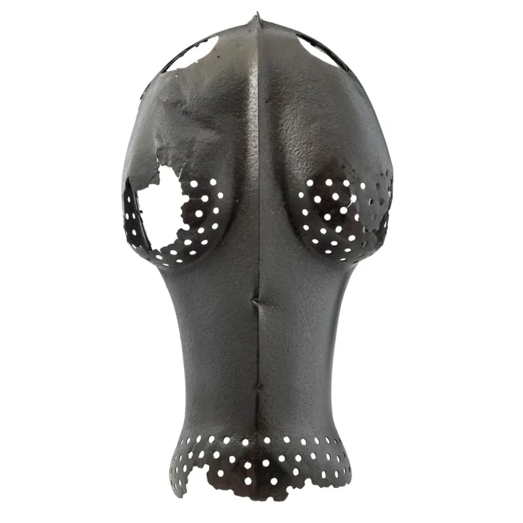 A main metal plate with embossed eye bulges, together with two side plates to fully enclose the head of the horse