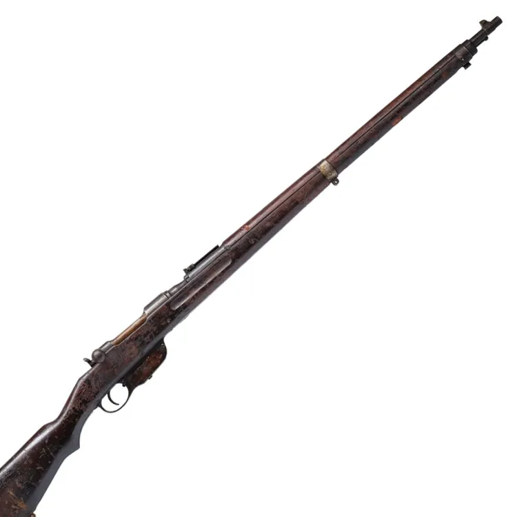A dark brown, long barrelled rifle in wood with iron and slight brass trim on the barrel