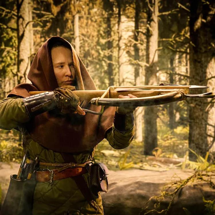 A hooded medieval hunter in the forest taking aim with their crossbow