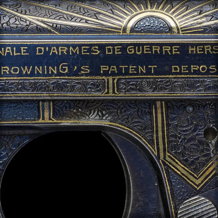 detail of a gun showing blue and gold decoration 