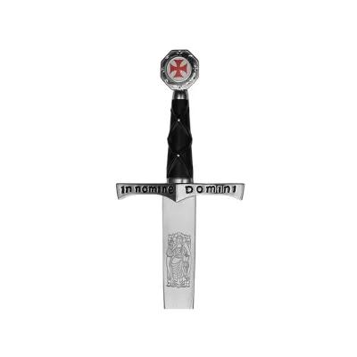 hilt of a sword with a red cross on the pommel, a black grip and an engraved guard and blade