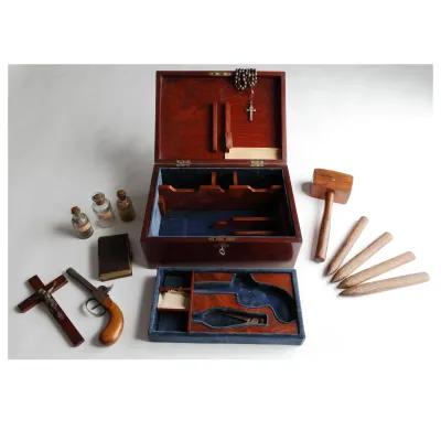 Wooden box with various wooden steaks, mallets and potions