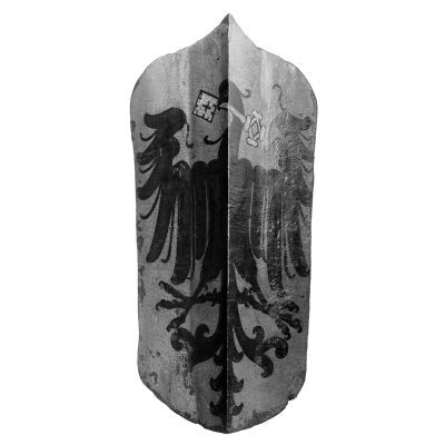 A painted rectangular wooden shield with rounded bottom and pointed top depicting an eagle with a key in its mouth