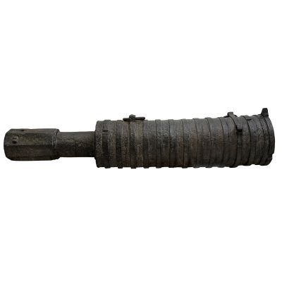 Wrought iron cannon with barrel bound by series of hoops